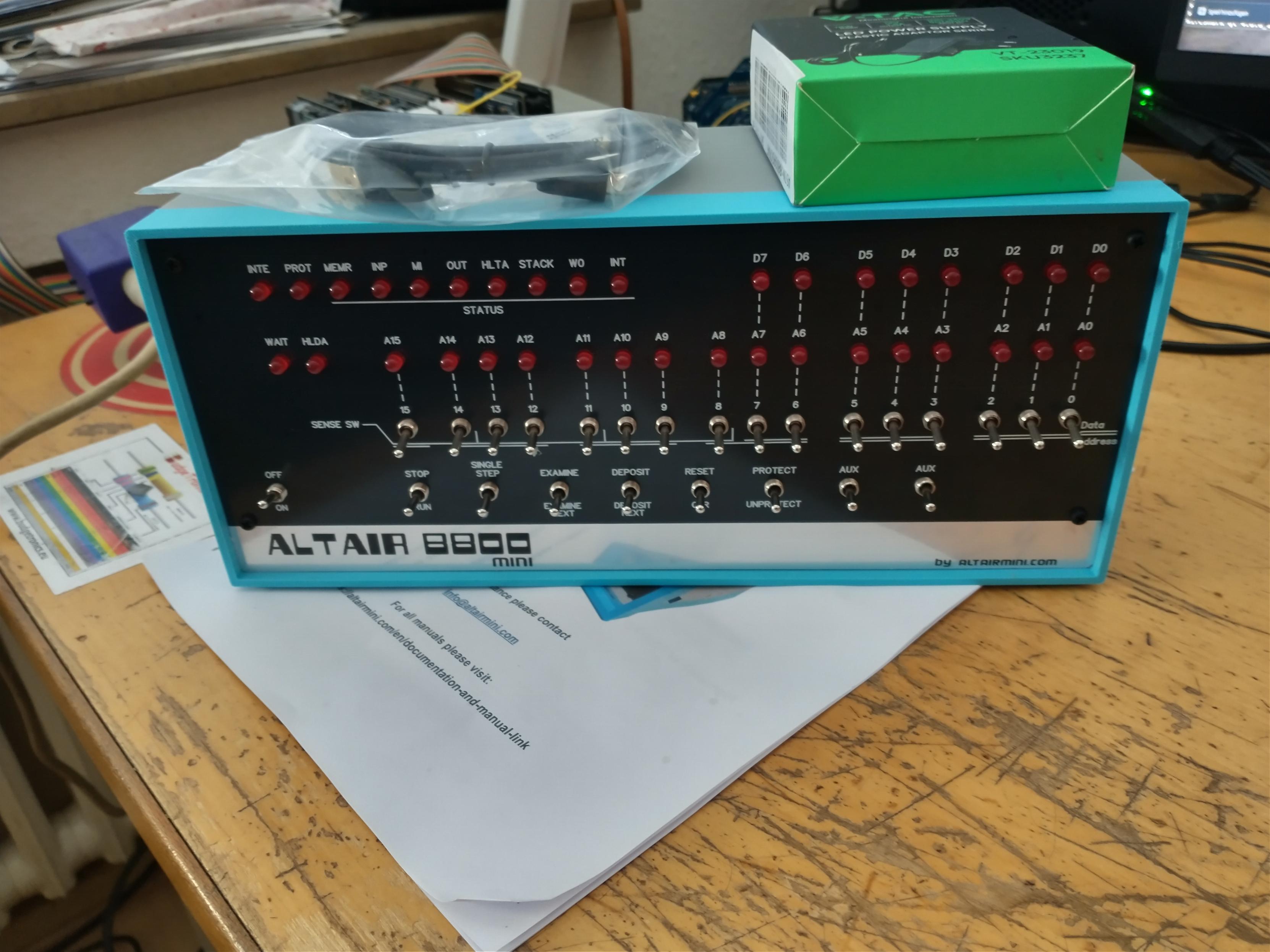 Photo of an Alitair 8800 mini replica computer with the iconic front panel featuring all the blinkenlights and control switches of the original machine image